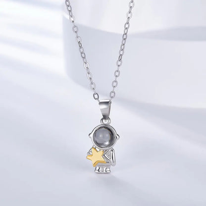 Astronaut Projection Necklace with Gold Star